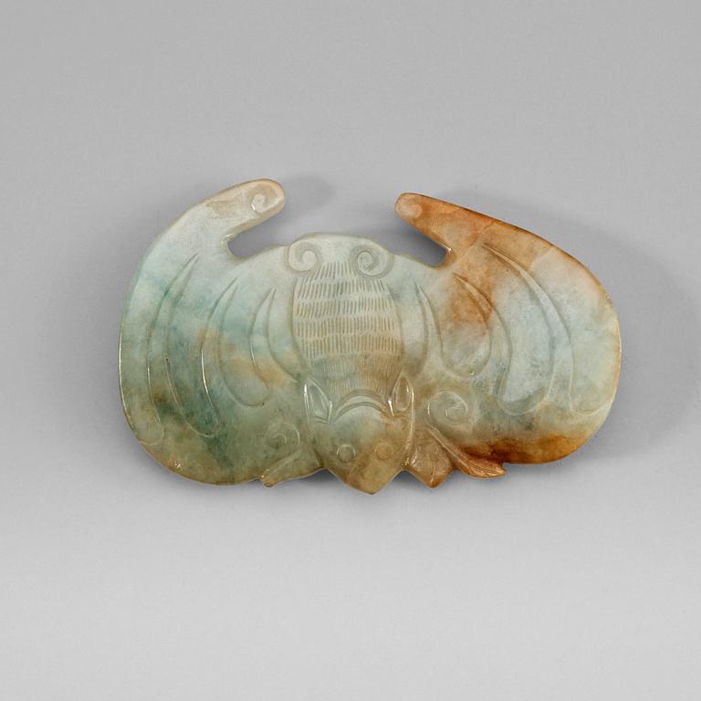 A bat-shaped, nephrite belt-buckle, late Qing dynasty (1644-1912).