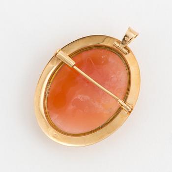 A pendant/brooch set with a shell cameo.