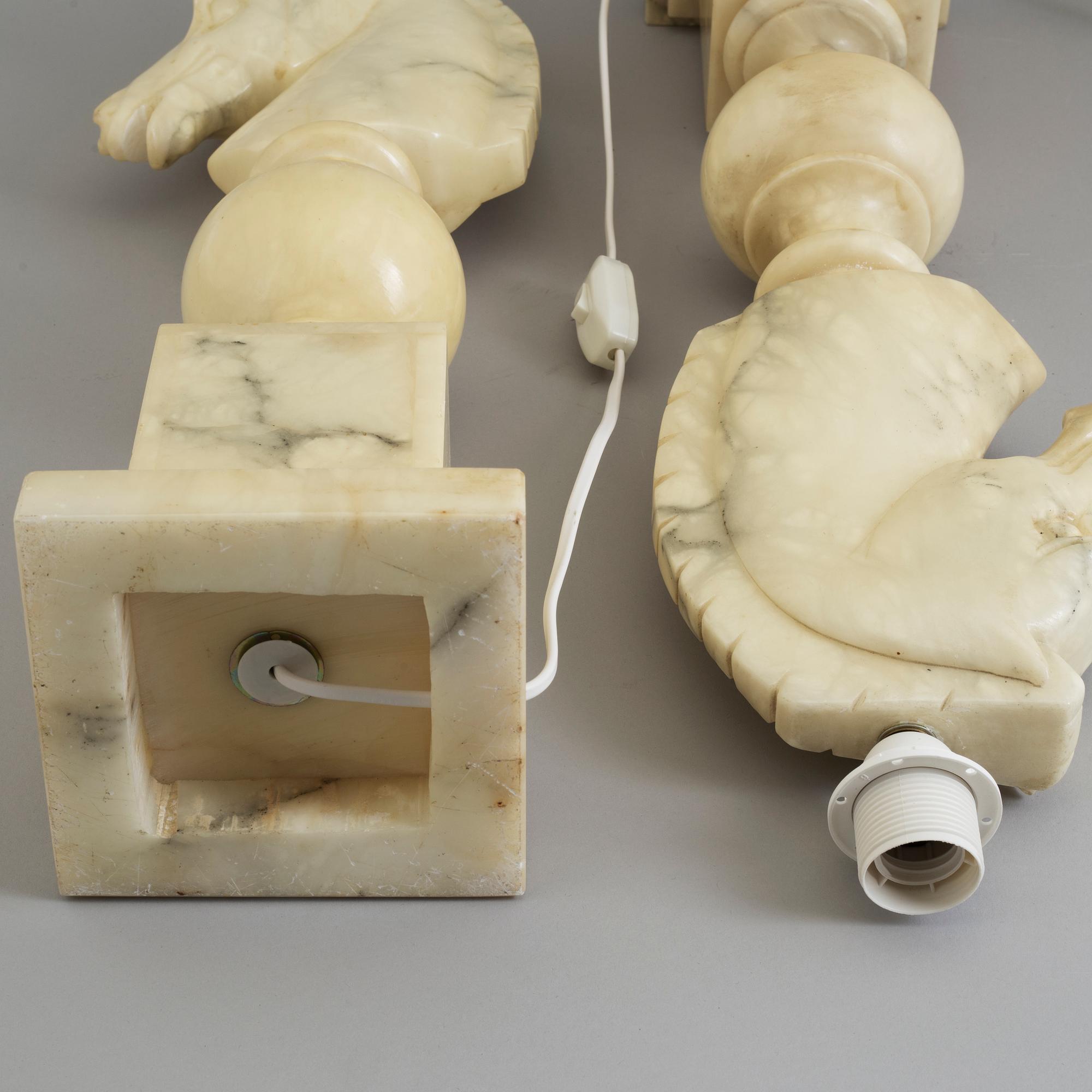 a pair of Italian alabaster table lights from the second half of the 20th century.
