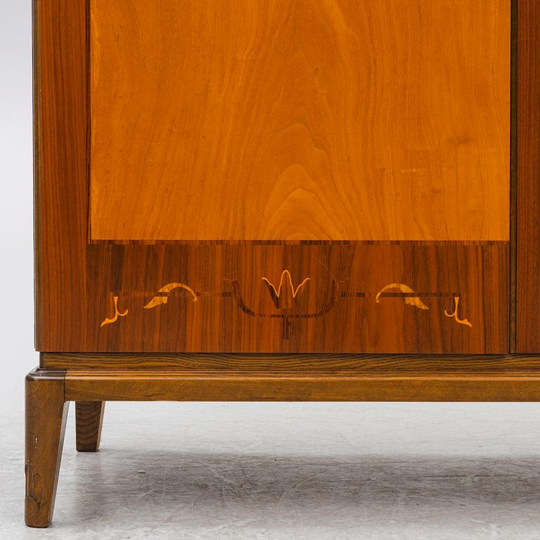 A Swedish Modern cabinet, mid20th century.
