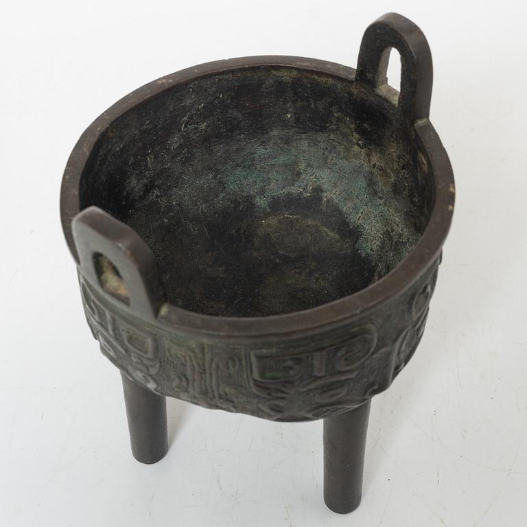 A Chinese tripod bronze censer, Ming style, Qing dynasty (1644-1912).
