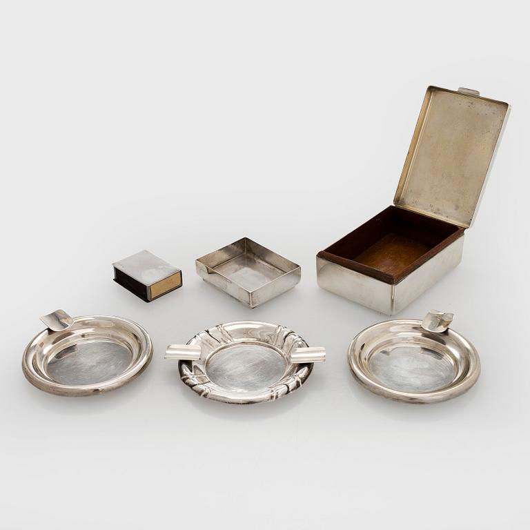 A silver cigarette case, matchbox holder and small bowl, Sandrik, as well as 3 ashtrays, Czechoslovakia 1929-1945.