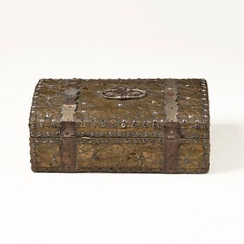 A presumably German baroque repoussé brass writing box, late 17th century.