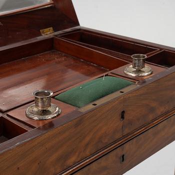 A French Empire mahogany sewing table, first part 19th century.
