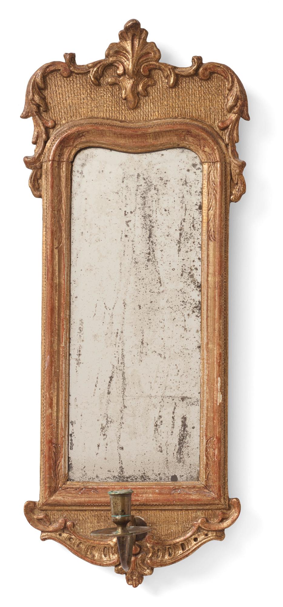 A rococo giltwood one-light girandole, later part of the 18th century.
