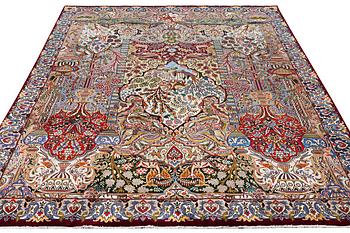 A Kashmar carpet, c. 398 x 294 cm.
