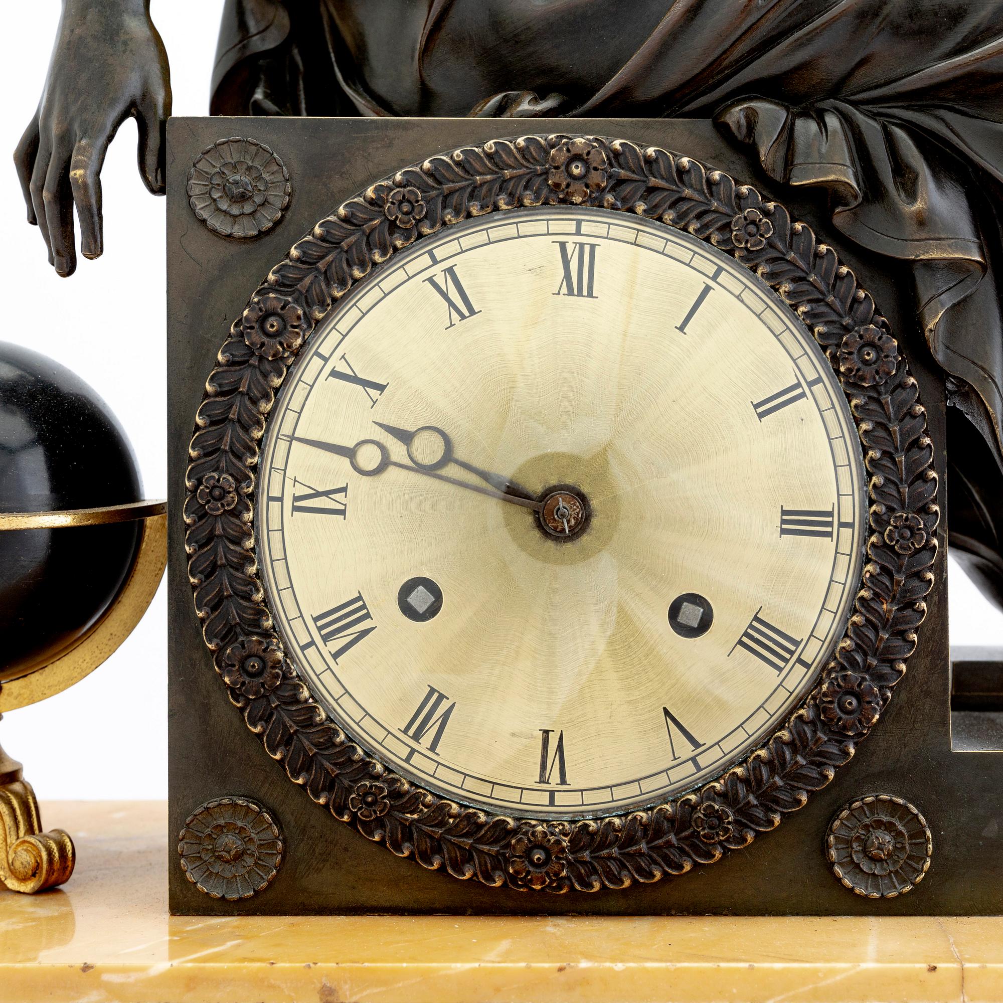 A late Empire mid 1800s table clock.