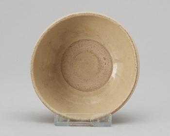 A cream glazed bowl, Tang dynasty.