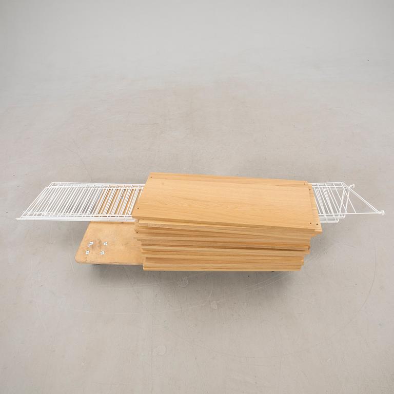 Nils Strinning, hyllsystem "Strinning" inköpt 2022.