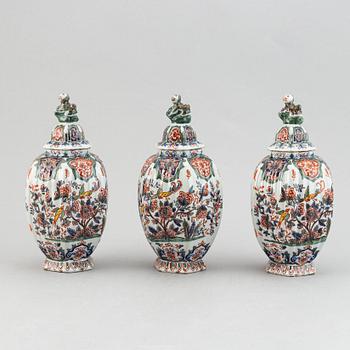 A five piece french faience garniture.