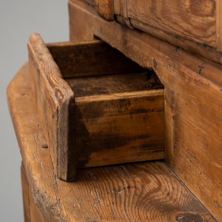 A traditional painted swedish cabinet dated 1744.