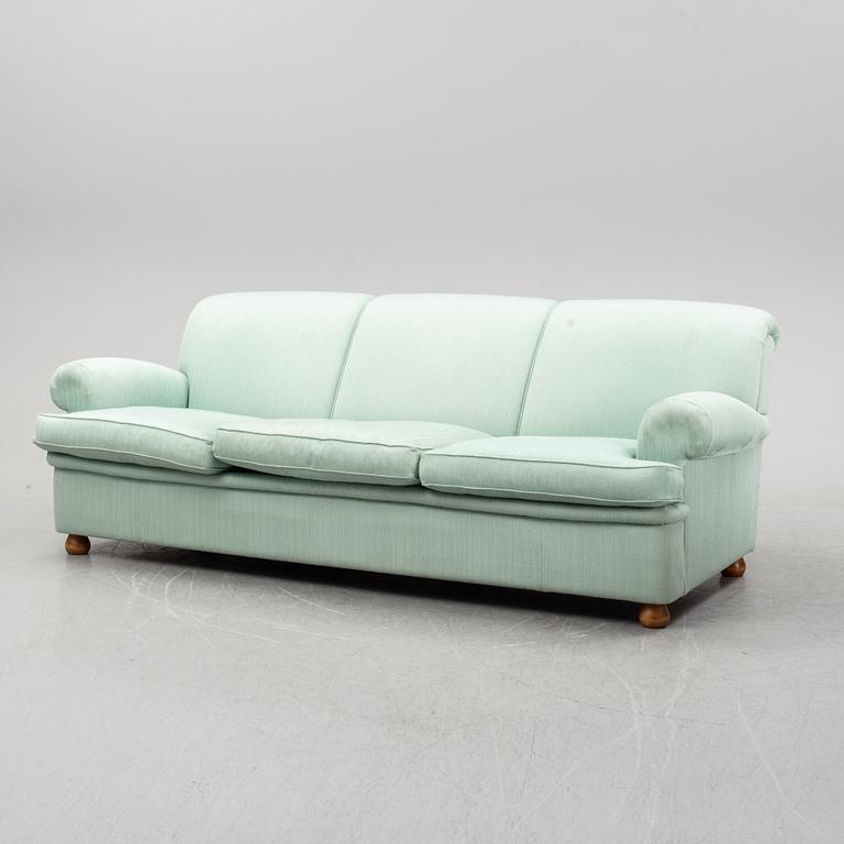 A model 703 sofa by Josef Frank for Firma Svenskt Tenn.