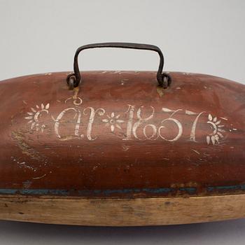 A painted folk art trough dated 1837.