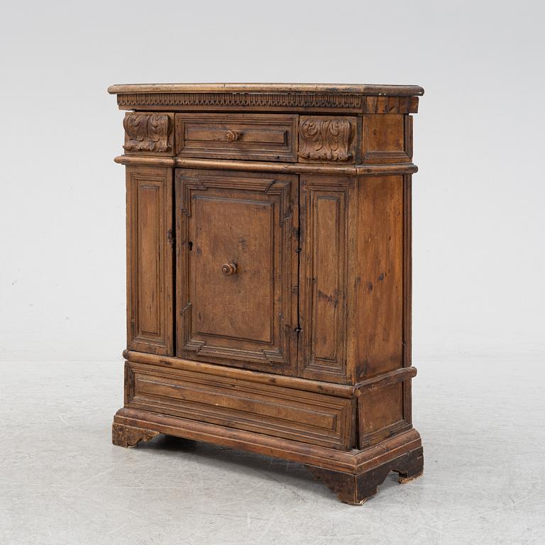 A Baroque style cabinet, circa 1900 with older parts.