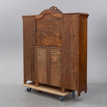 A second half of the 20th Century oak cupboard.