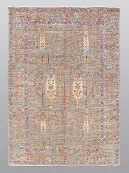 A rug, Ziegler design figural, ca 241 x 169 cm.