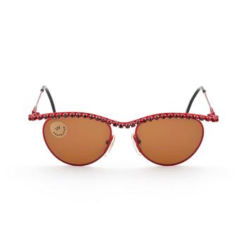 MOSCHINO, ett par solglasögon.