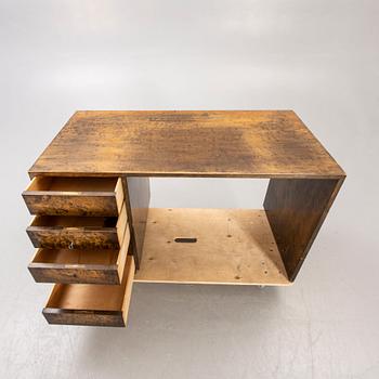 A 1930s birch desk.