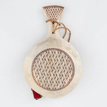 A reindeer horn cup, signed.