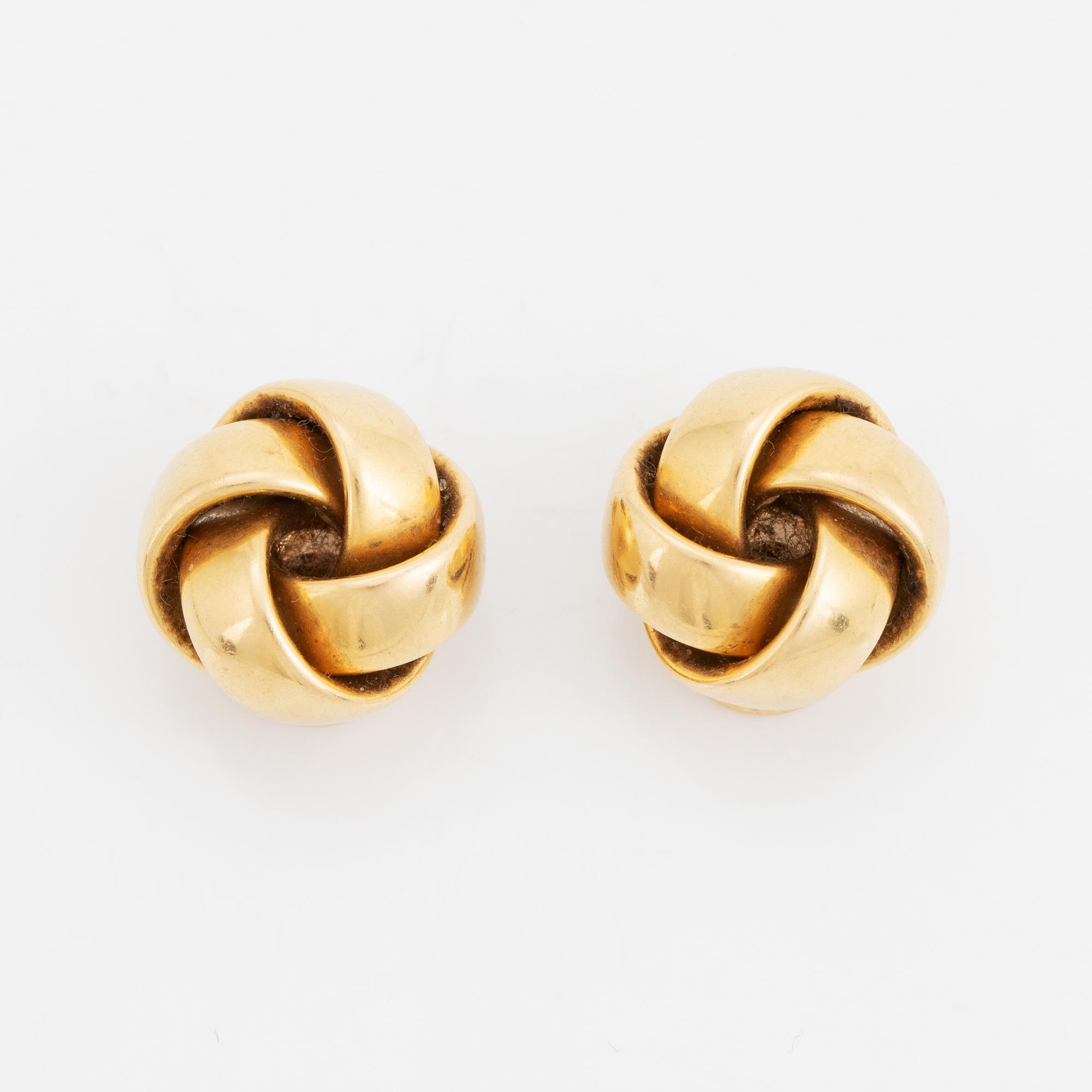18K gold clip earrings.