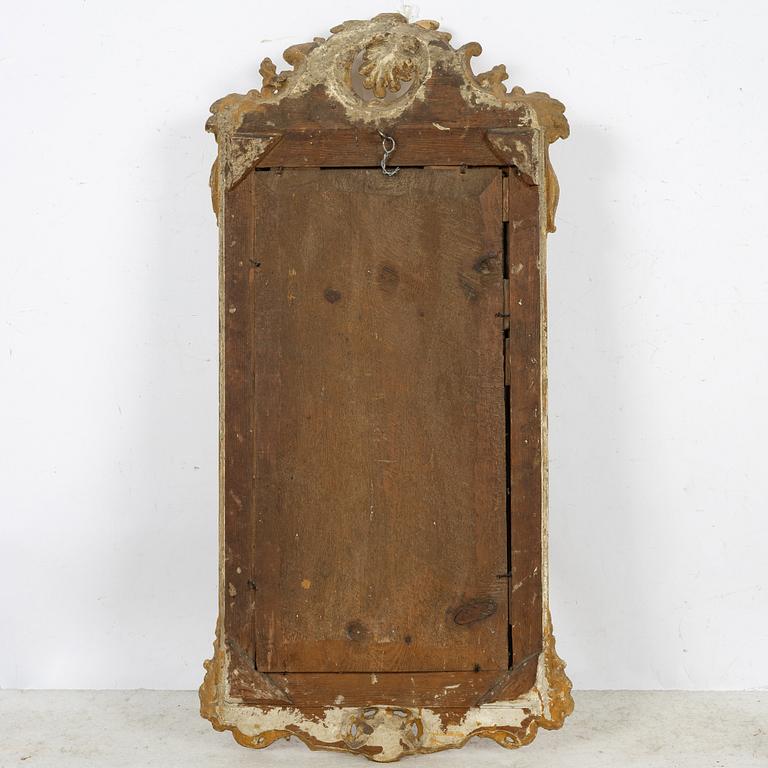 A giltwood rococo mirror, Stockholm, later part 18th century.