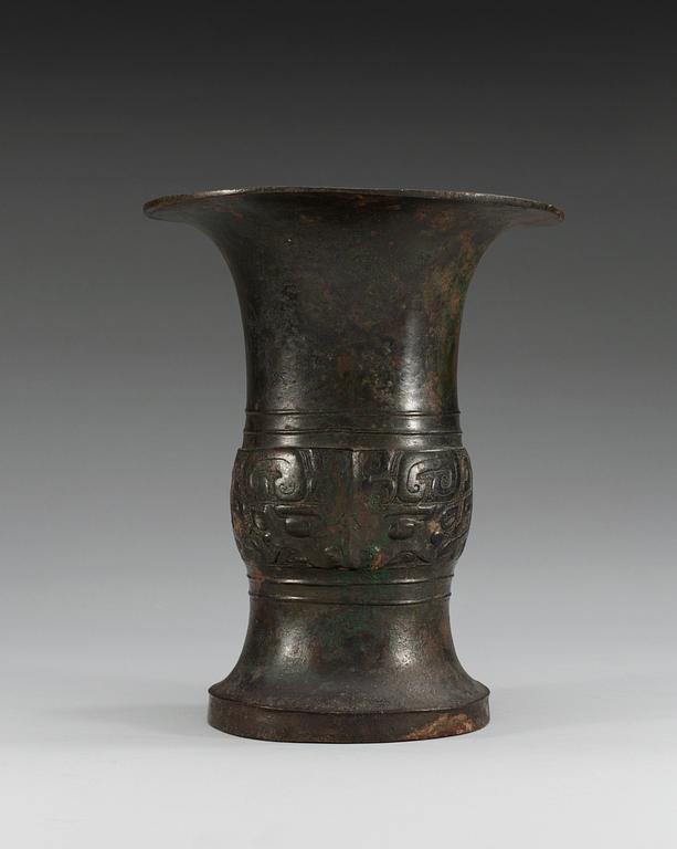 An archaic shaped bronze wine vessel, Tsun, in the style of Shang/early western Zhou style, presumably 17/18th Century.