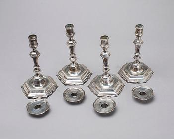 Two simular pairs of candlesticks, two marked Barde, Geneve 18th century, two with later marks.