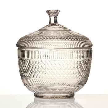 A cut glass punch bowl with cover, stand and ladle, Empire, first part of the 19th century.
