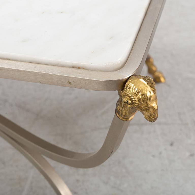 A marble top coffee table, probably Italy, second half of the 20th Century.