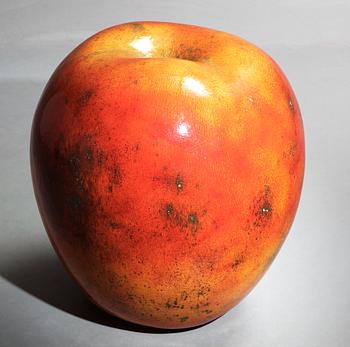 A Hans Hedberg faience sculpture of an apple, Biot, France.