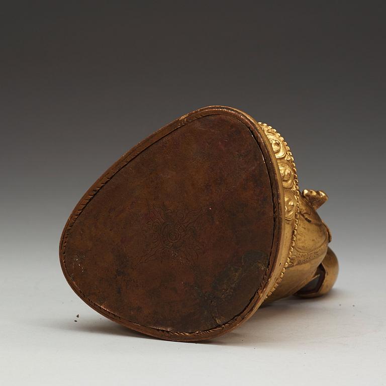 A Sino-Tibetan gilt copper alloy repoussé figure of Tsong Khapa, 18/19th Century.