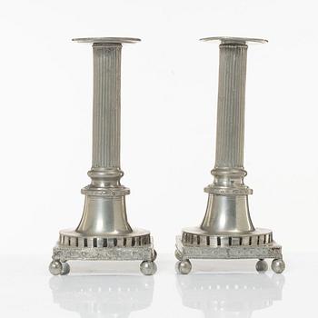A pair of late Gustavian pewter candlesticks by C. P. Eckerström, Västerås 1827.