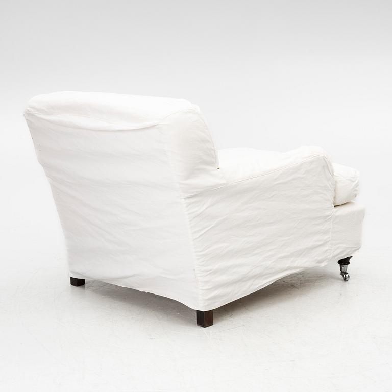 A Howard model armchair, contemporary.