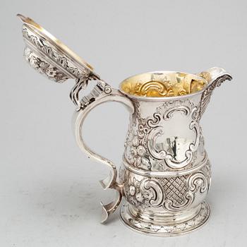 An English 18th century parcel-gilt silver jug, marked BB possibly Benjamin Brewood II, London 1762.