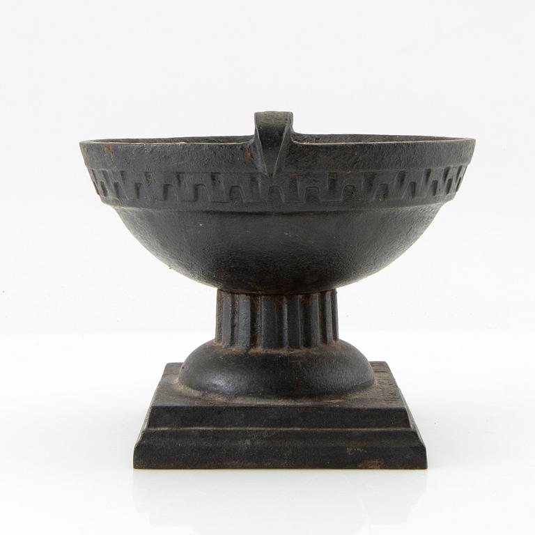 Cast iron urn, 20th century.