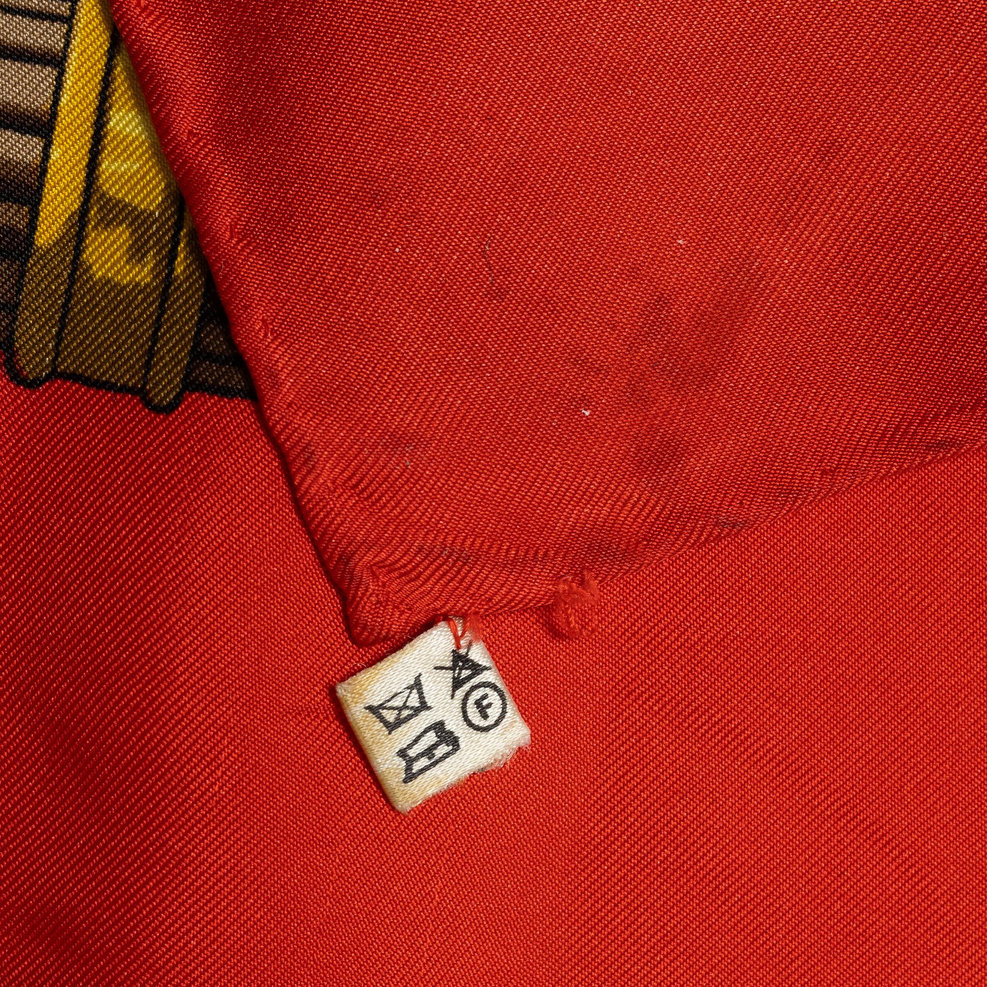Hermès, a 'Egypte - Scarabées et Pectoraux' scarf.