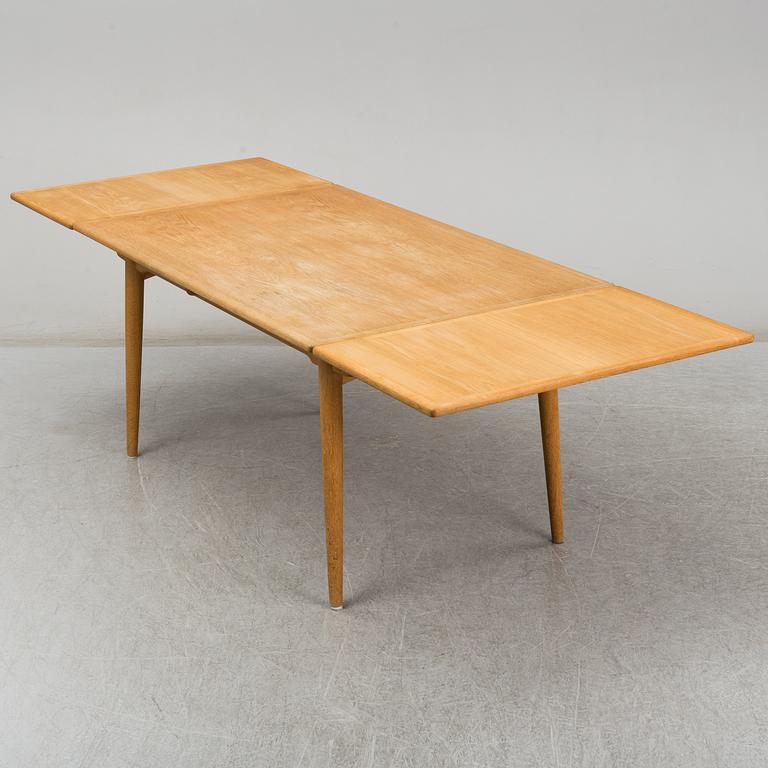 HANS J WEGNER, an "AT-312"  oak dining table. Andreas Tuck, Denmark.