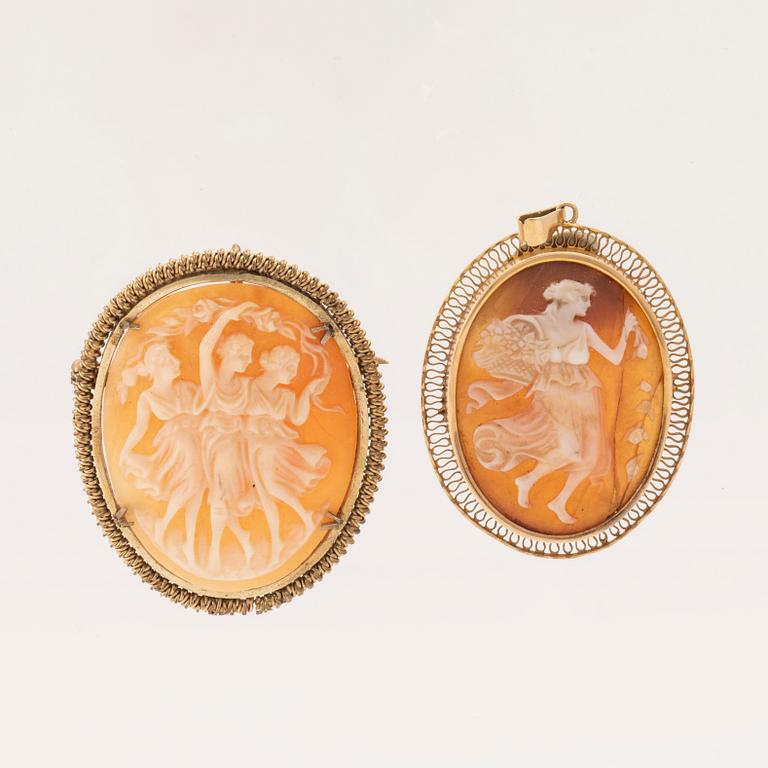 A pair of shell cameo pendants.