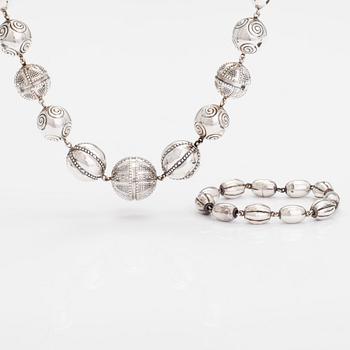 A set of sterling silver necklace and bracelet "Halikko treasure". Kalevala Koru, Helsinki 1967-72.