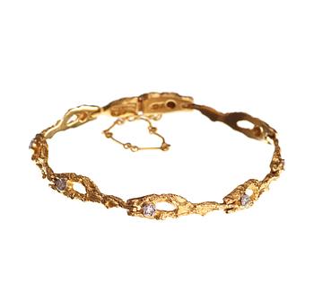 682. A Lapponia 18k gold bracelet with eight octogonally cut diamonds, Finland 1988.