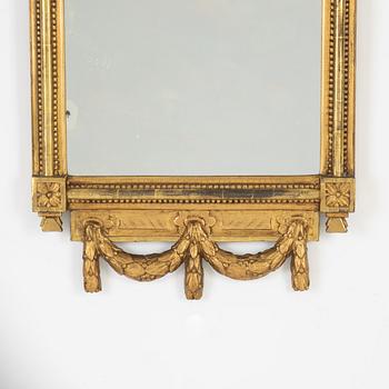 A Gustavian mirror, 1780s.