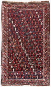 An antique Qashgai rug, 230 x 135 cm.
