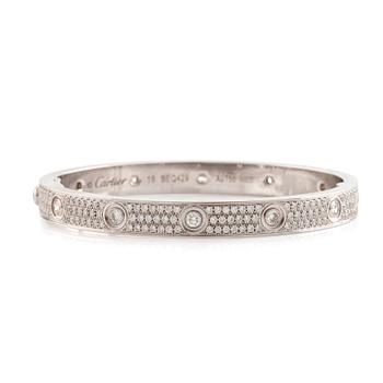 561. A Cartier "Love" bracelet in 18K white gold set with round brilliant-cut diamonds.