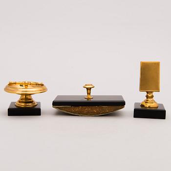 A late 19th Century Desk Set, 6 pcs in brass and stone, incl ink stand and a pair of candle sticks.