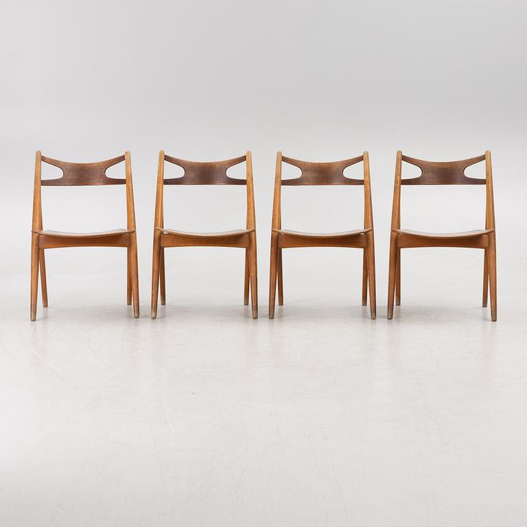 Hans J Wegner, four model CH 29 "The Savbuk Chair", Carl Hansen, 1960s.