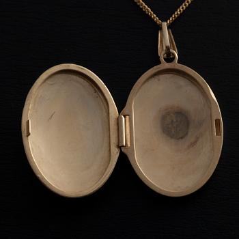 MEDALJONG/HÄNGE, 14K guld, akvamarin, 4 små diamanter. Vikt 5,8 g.