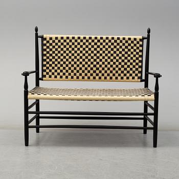 A Shaker style sofa and a pair of chairs, later part of the 20th century.