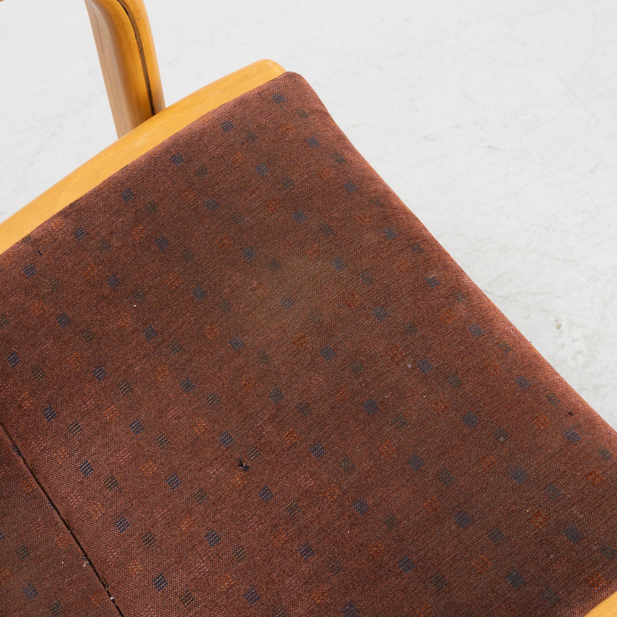 Yngve Ekström, a pair of armchairs, Swedese, late 20th century.