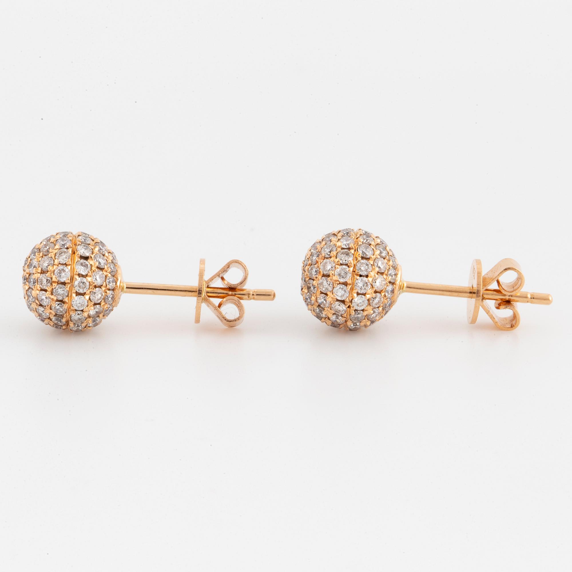 Brilliant-cut diamond ball earrings.