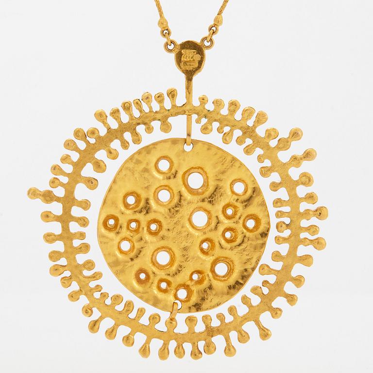 A Tapio Wirkkala pendant "Moon landscape" in 18K gold.